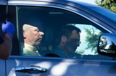 Republican candidate for Montana’s only U.S. House seat, Greg Gianforte, sits in a vehicle near a Discovery Drive building Wednesday, May 24, 2017, in Bozeman, Mont. A reporter said Gianforte “body-slammed” him Wednesday, the day before the special election. (Freddy Monares/Bozeman Daily Chronicle via AP)