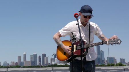 Justin Townes Earle performs on the roof of the Melcher Center for Public Broadcasting