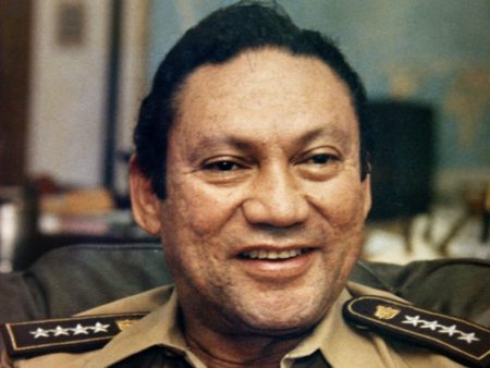 In this Nov. 8, 1989, photo, Panamanian military leader Gen. Manuel Noriega talks to reporters in Panama City. Panama's ex-dictator died Monday in a hospital in Panama City. He was 83.