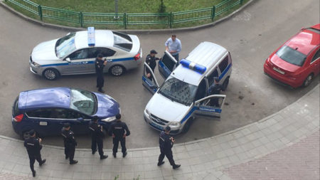 Alexei Navalny is seen being detained by police outside his apartment in Moscow in this photo provided by the Navalny Anti Corruption Fund.
