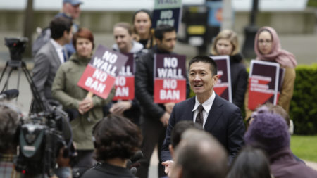 Hawaii Attorney General Doug Chin speaks to media outside the 9th Circuit U.S. Court of Appeals in Seattle, Washington, on May 15, 2017. The court has largely upheld a preliminary injunction blocking President Trump's travel ban from going into eff