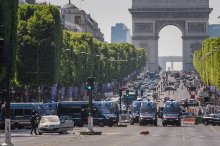 Attacker who hit police van in Paris is dead, man's car had explosives