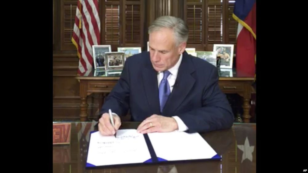 Texas Governor Greg Abbott signs the "Sanctuary Cities" bill, SB 4, into law on Facebook Live.