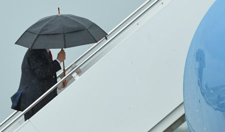 President Trump boards Air Force One before departing from Morristown Municipal Airport in New Jersey over the weekend. Trump is meeting with Russian President Vladimir Putin, among other heads of state, at the G-20 summit.