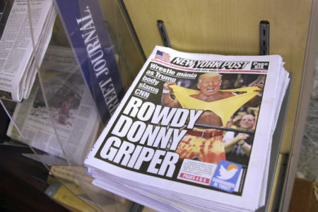 Copies of the New York Post with an illustration of President Donald Trump as a professional wrestler on the front page are displayed at a newsstand in New York City, Monday, July 3, 2017. On Sunday, Trump's apparent fondness for wrestling emerged in a tweeted mock video that shows him pummeling a man in a business suit with his face obscured by the CNN logo.