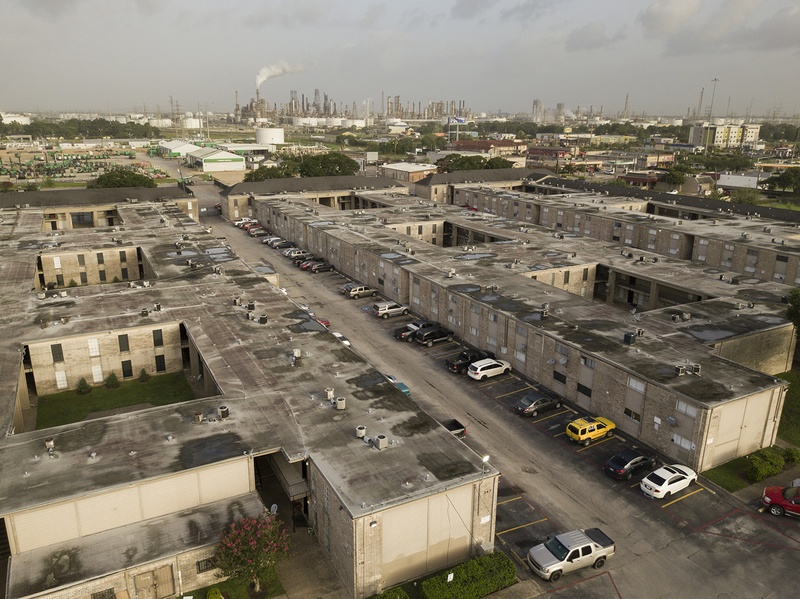 An old apartment complex within view of the ship channel refineries on the north side of Pasadena, Texas, July 1, 2017.