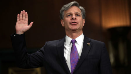 Christopher Wray is sworn in during the confirmation hearing on his nomination for FBI director before the Senate Judiciary Committee last month.