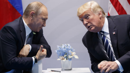 President Donald Trump meets with Russian President Vladimir Putin at the G-20 Summit in early July. It's unclear how sanctions Trump signed into law this week will affect the personal relationship between the two men.