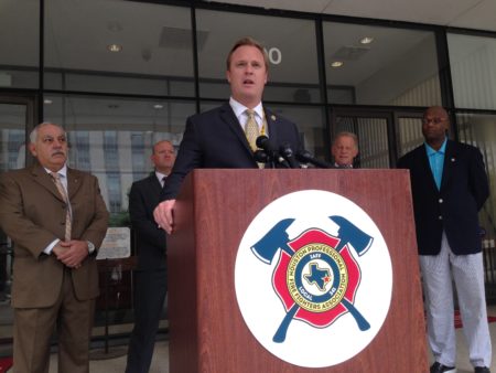Marty Lancton, president of the Houston Professional Fire Fighters Association, speaks at a press conference held at the entrance to the City Hall Annex building, in downtown Houston.