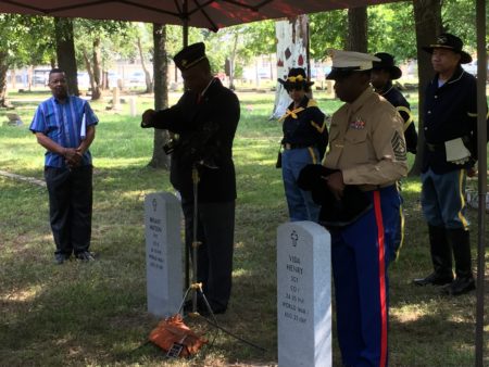 Head stones are unveiled at College Park Memorial Cemetery on Dallas Street at the unmarked graves of two black soldiers.