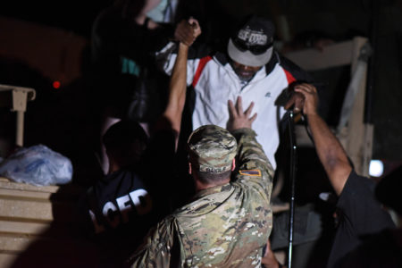 Louisiana National Guardsmen from 3rd Battalion, 156th Infantry Regiment, 256th Infantry Brigade Combat Team work around the clock to ensure that residents in danger of flooding from Tropical Storm Harvey are safe in Lake Charles, Louisiana, August 29, 2017. (U.S. Army National Guard photo by Sgt. Garrett L. Dipuma)