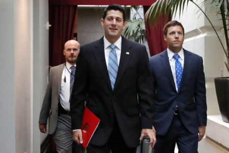 House Speaker Paul Ryan of Wisconsin, center, arrives for a meeting with House Republicans, Wednesday, Sept. 6, 2017, on Capitol Hill in Washington.