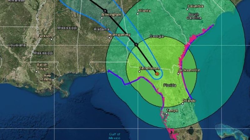 Irma is now a tropical storm — but it still poses severe flooding threats across Florida and into neighboring states. The storm's predicted path is seen here in forecasters' 11 a.m. ET release.