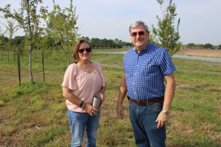 John Branch, board president of the CLCWA, and Jackie Hutto, communications director of the Exploration Green Conservancy, stand on the site of Phase 1 of the project.