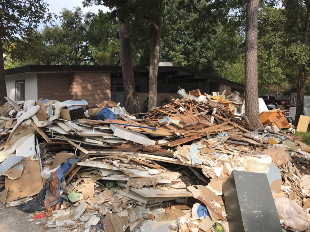 Debris is piled outside in Harvey's aftermath.