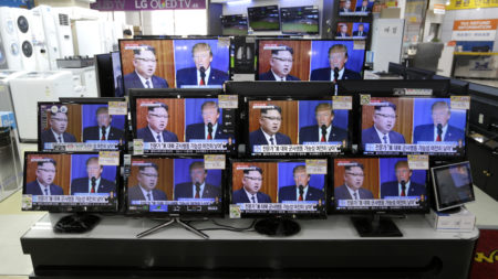 TV screens at a store in Seoul, South Korea, show news coverage of the latest exchange of insults between President Trump and North Korean leader Kim Jong Un.