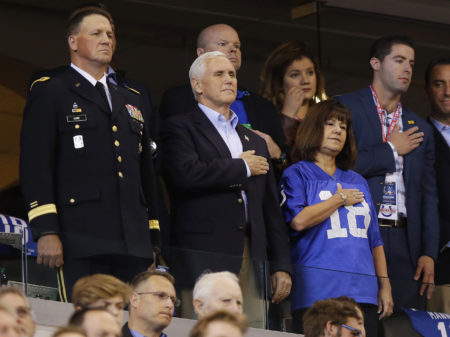 Vice President Pence and his wife, Karen, stand for the national anthem before Sunday's game between the Indianapolis Colts and the San Francisco 49ers in Indianapolis