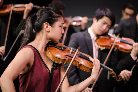 Natalie Lin, violinist performing with her ensemble KINETIC