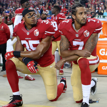 San Francisco 49ers Eric Reid (35) and Colin Kaepernick (7) take a knee during the National Anthem prior to their season opener against the Los Angeles Rams during an NFL football game on Monday, Sept. 12, 2016, in Santa Clara, CA.