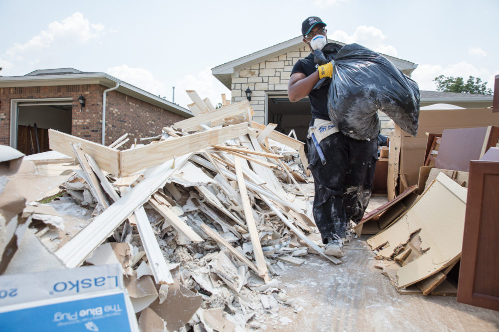 HOUSTON, TEXAS, USA (09/02/17)- Volunteer Lloyd L. Clemons removes debris from a flooded Habitat house. Volunteers from Houston Habitat for Humanity are already at work cleaning out homes flooded by Hurricane Harvey in northeast Houston. Habitat for Humanity International is planning for long-term recovery in impacted areas.
©Habitat for Humanity International/Jason Asteros