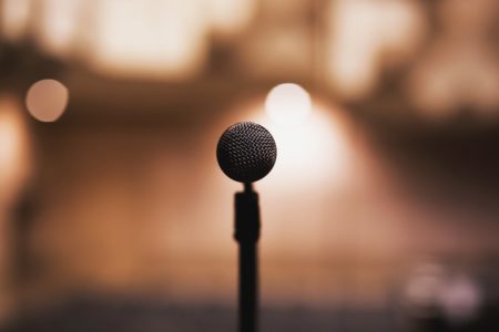 Microphone On A Podium In Front Of An Auditorium