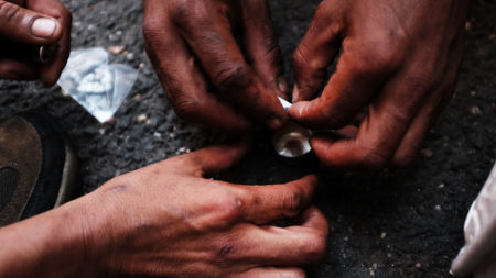 Heroin users prepare the drug in New York City's South Bronx neighborhood.