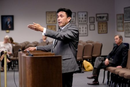 Tony Diaz defends his book, "The Mexican American Studies Toolkit," at a State Board of Education hearing on Tuesday, Nov. 7, 2017. The SBOE might approve the first ethnic studies textbook this year, after critics shot down a previous submission as racist. In the background is Stephen Smith, seated right, who opposes the book.