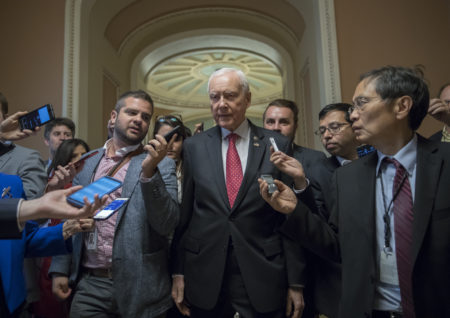 Senate Finance Committee Chairman Orrin Hatch, R-Utah, surrounded by reporters in the U.S. Capitol. The committee will hold its hearing on its tax bill next week. Senators aim  to pass it out of committee before the Thanksgiving holiday