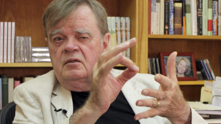 Garrison Keillor, creator and former host of "A Prairie Home Companion," talks at his St. Paul, Minn., office in July.
