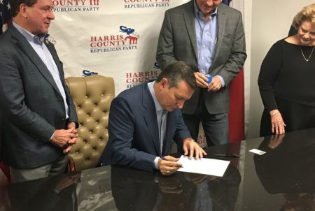 U.S. Sen. Ted Cruz, R-Texas, signs paperwork to file for re-election Saturday at the Harris County GOP headquarters in Houston.
