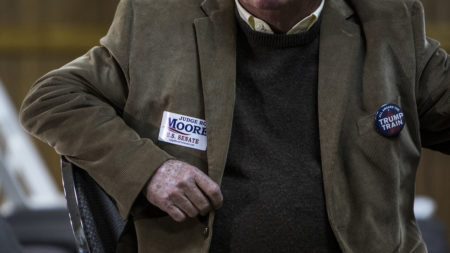 Judge Roy Moore supporters wait for a campaign rally to begin on November 27, 2017 in Henagar, Alabama.