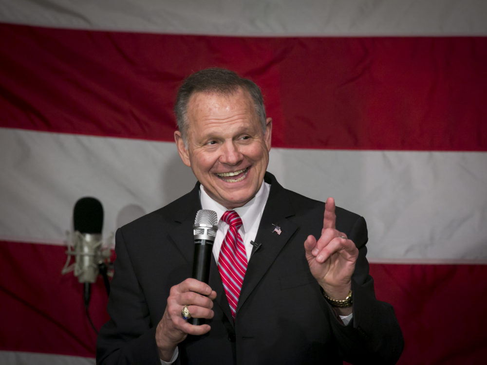 Roy Moore, Republican candidate for the Senate from Alabama, smiles as he speaks during a campaign rally in Fairhope, Ala., Dec. 5.