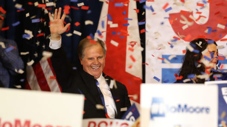 Democrat Doug Jones greets supporters before his victory speech Tuesday night. Jones defeated controversial Republican Roy Moore to become the first Democratic senator elected from Alabama in 25 years.