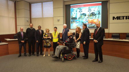Metro's board honored rail technician Leang "Terry" Ear for his quick action after a car crash on the East End light rail line.
