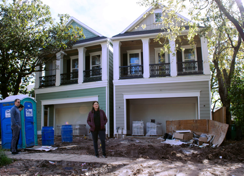 Jocelyn Guite stands outside her new home, currently under construction, in Houston's Montrose neighborhood.  