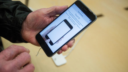 Apple says that it slows the processors in some of its older phones to match their aging, less powerful batteries. Here, the iPhone 6s Plus is seen at an Apple Store in late 2015.