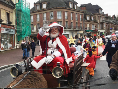 Retired American photographer Tom Haley, 66, portrays Santa during a pageant in Normandy.