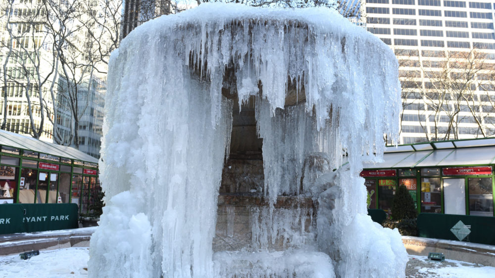 The Josephine Shaw Lowell Memorial Fountain at Bryant Park in New York City was frozen on Tuesday, as New Yorkers return  to work after the holiday break