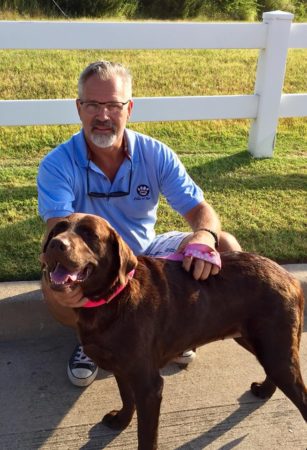 Photo provided by Best Fur Friends Rescue, shows Dr. Bill Kinsinger, with a dog.