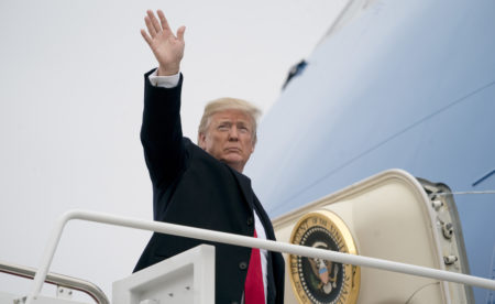 President Trump boards Air Force One at Andrews Air Force Base, Md., on Monday, to travel to Nashville, Tenn., to address the American Farm Bureau Federation. In the speech, he repeated a claim about the unemployment rate.