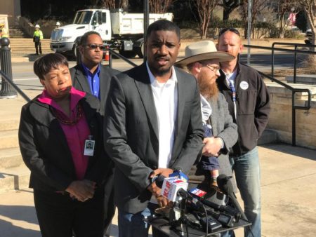 Dominique Alexandor, a pastor and leader of Next Generation Action Network, says Abbott's inclusion as an honorary grand marshal in a Martin Luther King Day parade is "an insult to the black community."