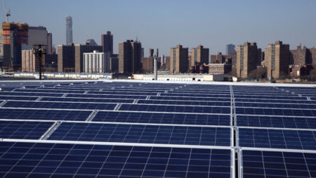 A rooftop is covered with solar panels at the Brooklyn Navy Yard in New York last February. The Trump administration is considering whether to impose tariffs on imports of solar materials.