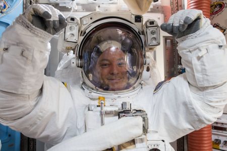NASA astronaut Scott Tingle on Tuesday, Jan. 23, 2018, ready to give the robot arm a new hand.