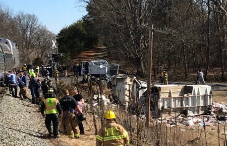 A chartered train carrying dozens of GOP lawmakers to a Republican retreat in West Virginia struck a garbage truck south of Charlottesville, Va., on Wednesday, lawmakers said. This photo provided by Rep. Greg Walden, R-Oregon, shows the crash site near Crozet, Va., on Wednesday.
