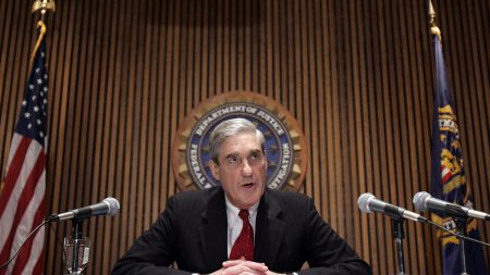 FBI Director Robert Mueller speaks at a news conference at FBI headquarters on March 9, 2007.