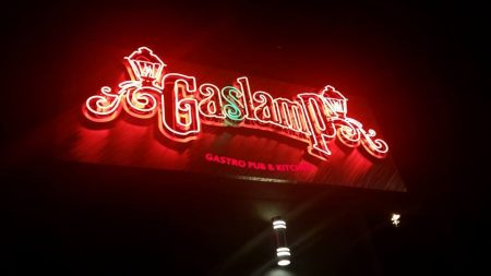 The Justice Department has reached a settlement in a discrimination lawsuit against the Gaslamp bar in Midtown.