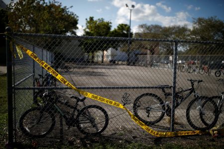 The bicycles that were left behind are seen at the Marjory Stoneman Douglas High School, after the police security perimeter was removed, following a mass shooting in Parkland, Florida, U.S., February 18, 2018.