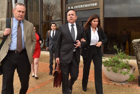 State Sen. Carlos Uresti, D-San Antonio (center) leaves the federal courthouse in San Antonio with his wife, Lleana Uresti and attorney Tab Turner, on Tuesday, Feb. 20, 2018.