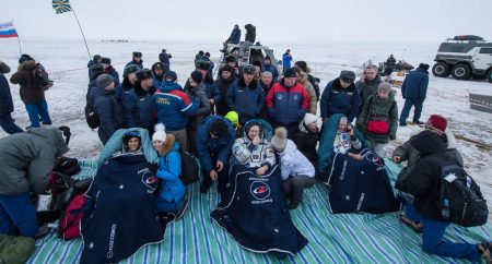 NASA astronaut Joe Acaba, Russian cosmonaut Alexander Misurkin and NASA astronaut Mark Vande Hei relax after their return trip from the International Space Station to their landing site southeast of the remote town of Dzhezkazgan in Kazakhstan, where they touched down at 9:31 p.m. EST Tuesday, Feb. 27, 2018.