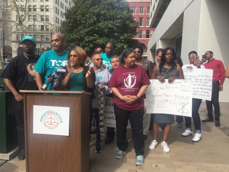 Tarsha Jackson (third from the left), Texas Organizing Project’s criminal justice director, led a press conference held in downtown Houston during which she and other members of her organization demanded that Harris County settles the lawsuit on its bail system.